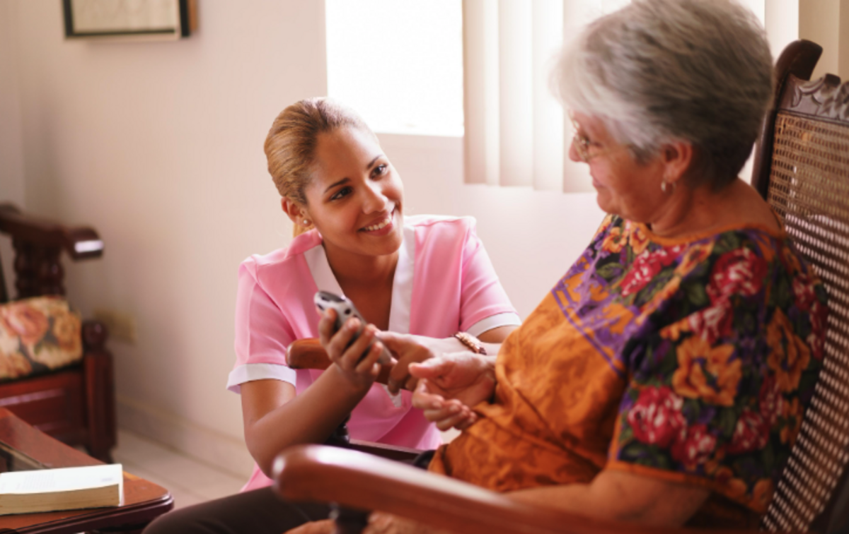 Care professional providing companion support to an older adult